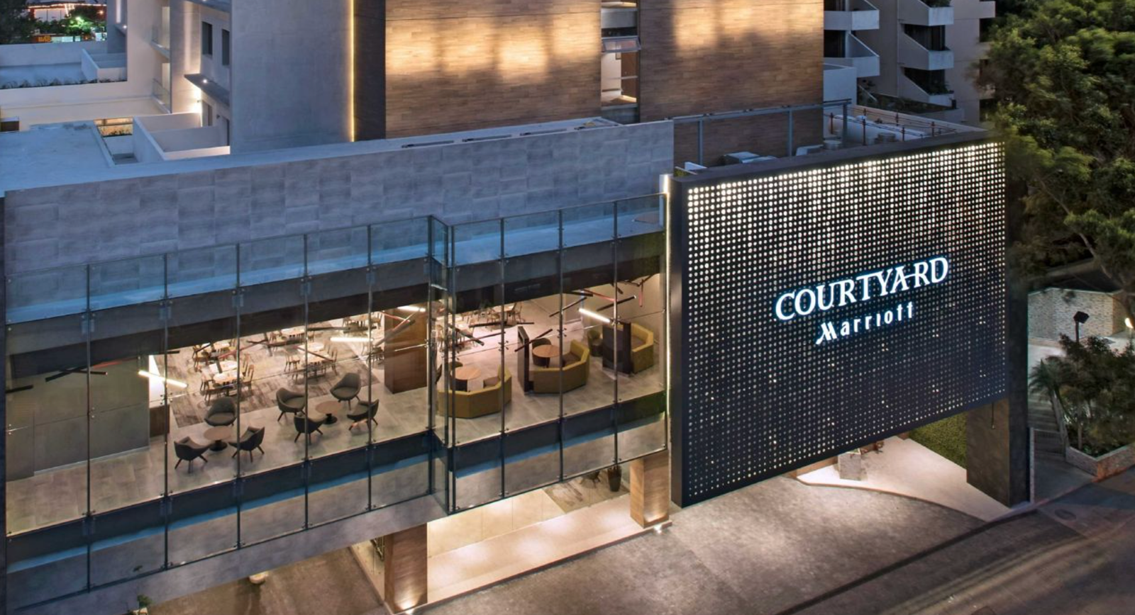 Courtyard Guatemala City hotel exterior entrance at night, Guatemala