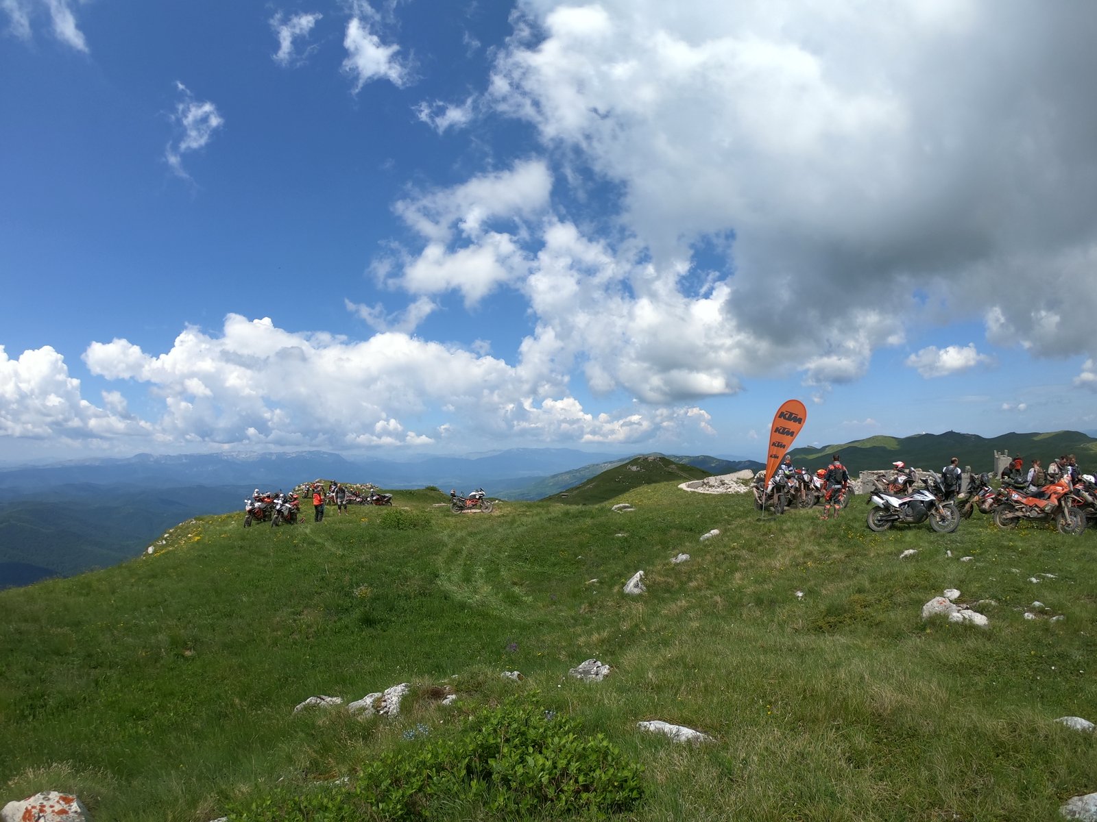 KTM Adventure Rally Bosnia 2019 — riders group shot on mountain summit