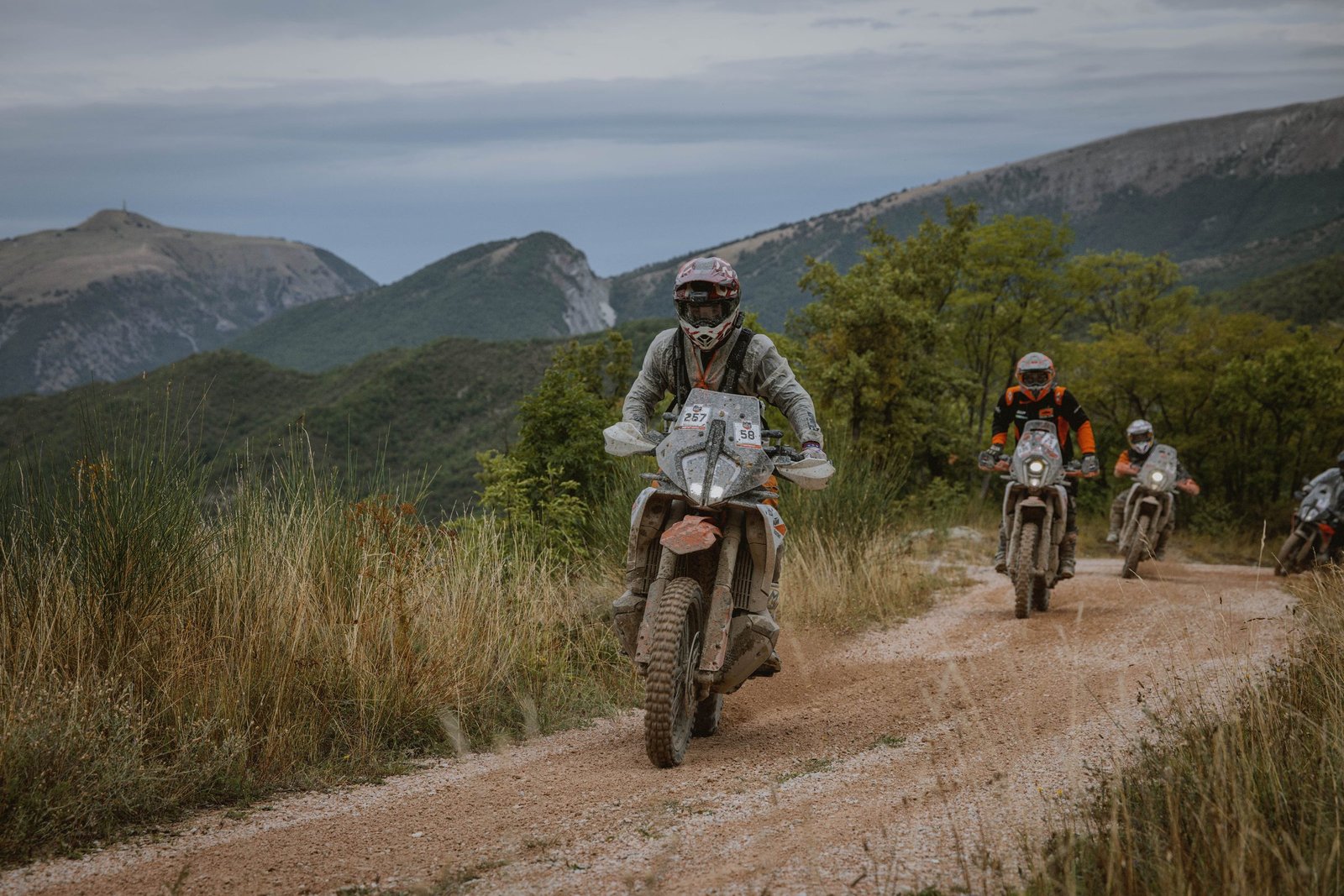 KTM riders on an Apennine gravel trail on Day 3, Italy