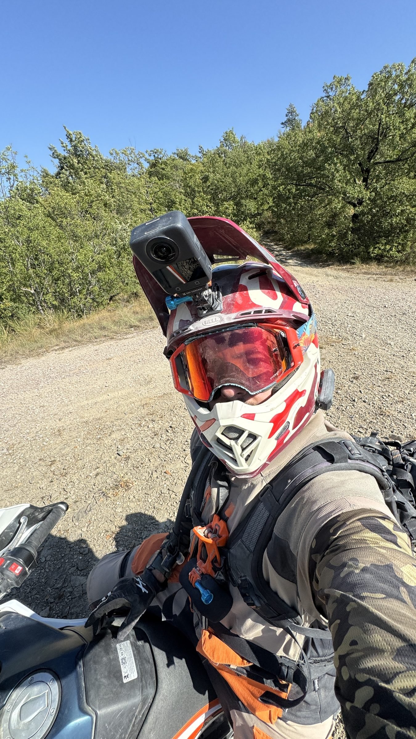 Helmet selfie on a gravel road at the KTM Adventure Rally Italy
