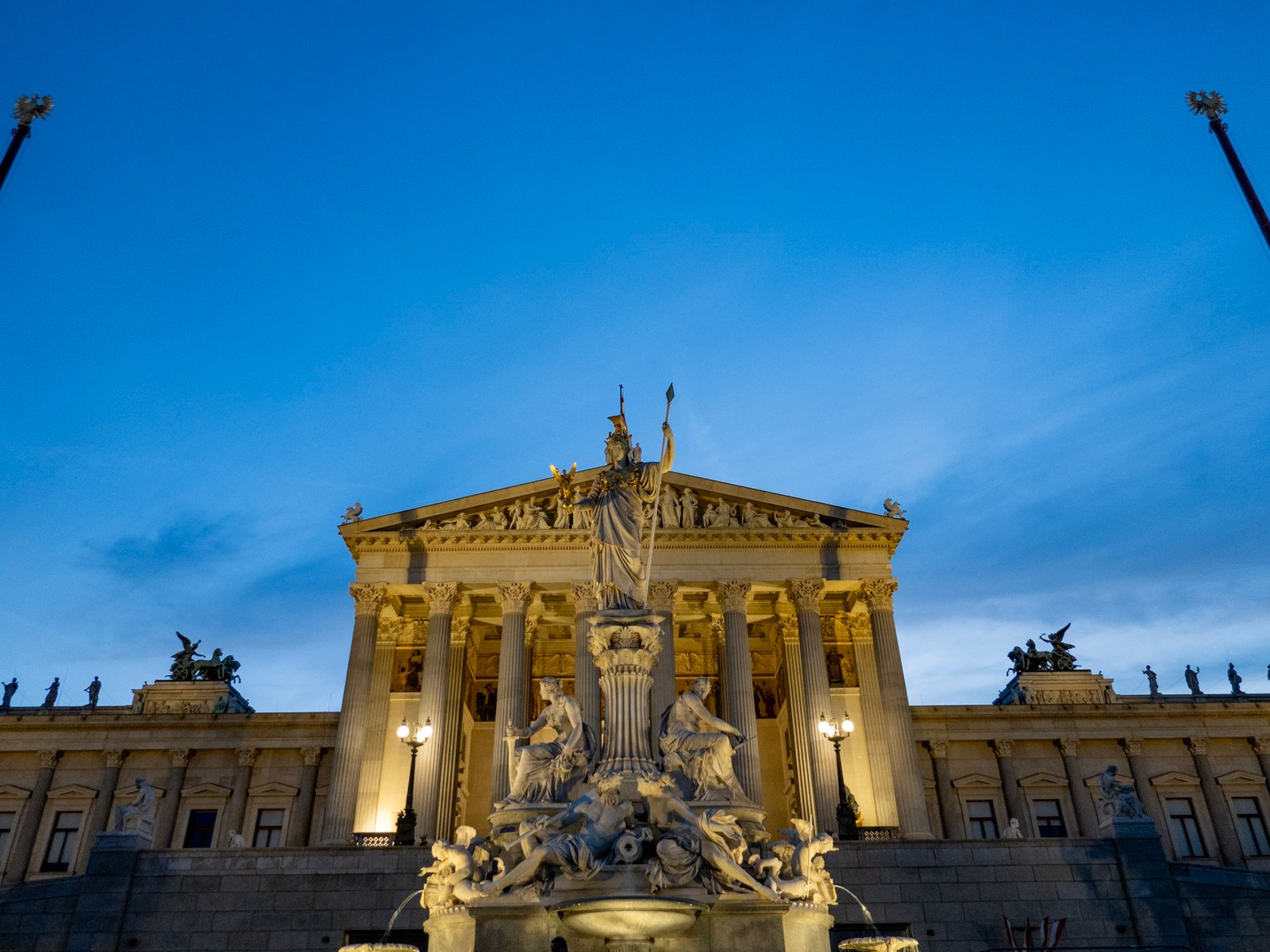 Austrian Parliament and Pallas Athena fountain at dusk, Vienna