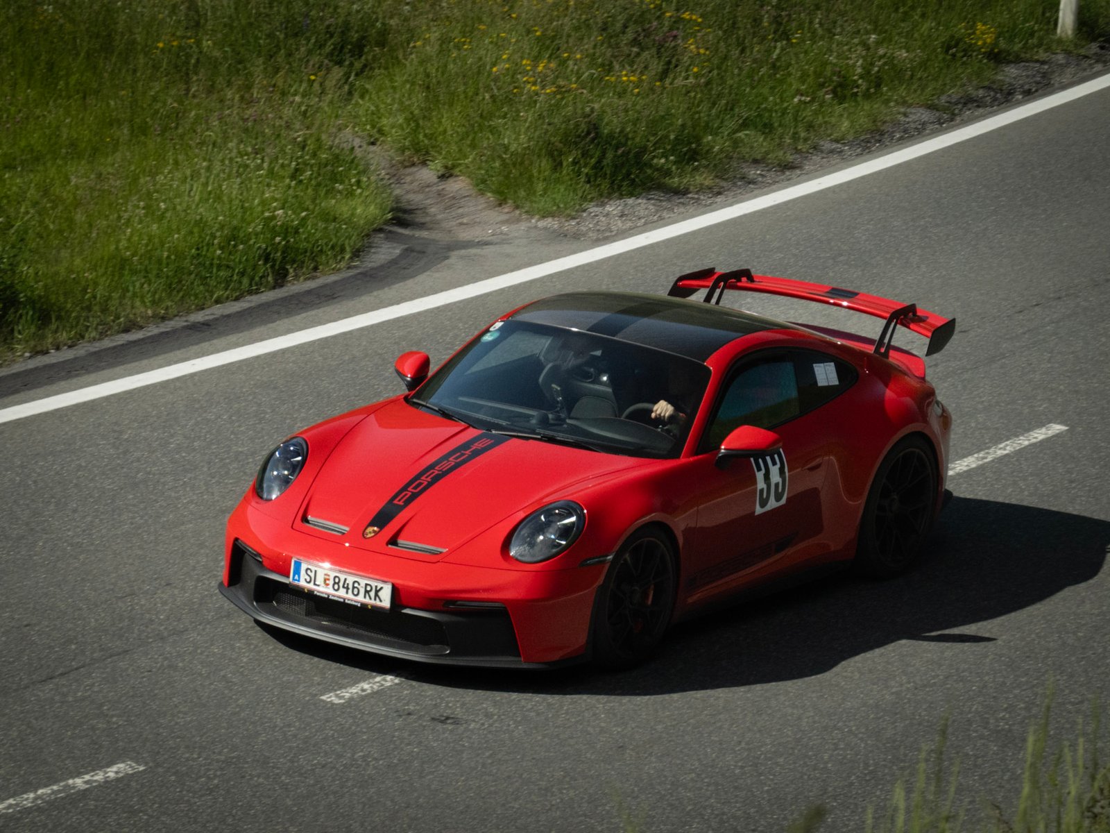 Porsche 911 competing at the Arlberg Mountain Slalom 2026 Austria