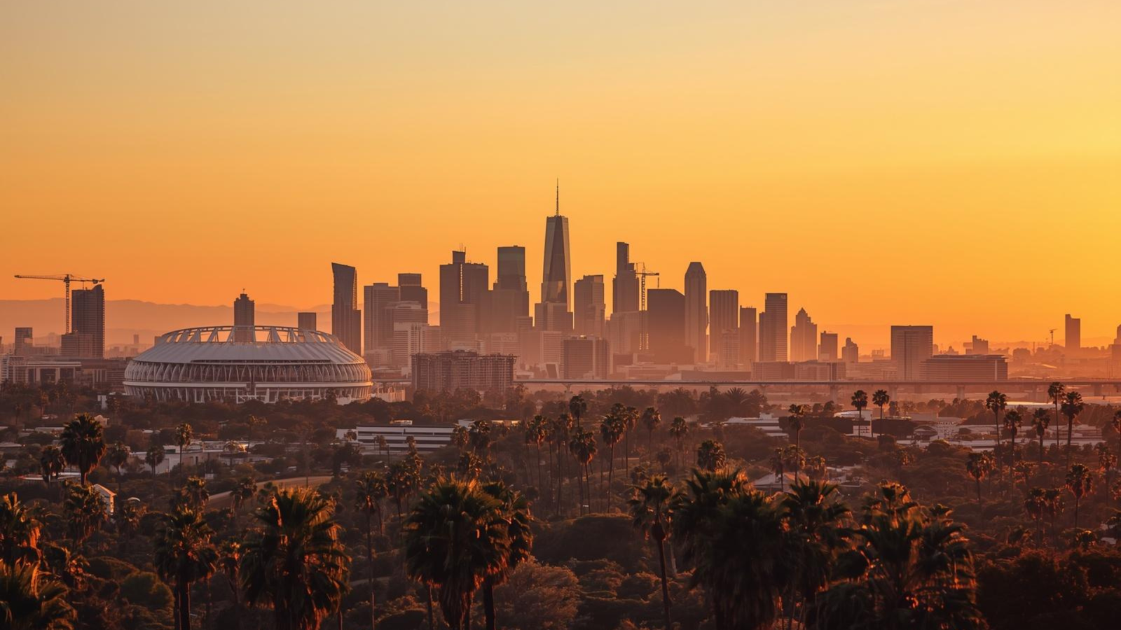 Los Angeles skyline at sunset with SoFi Stadium World Cup 2026
