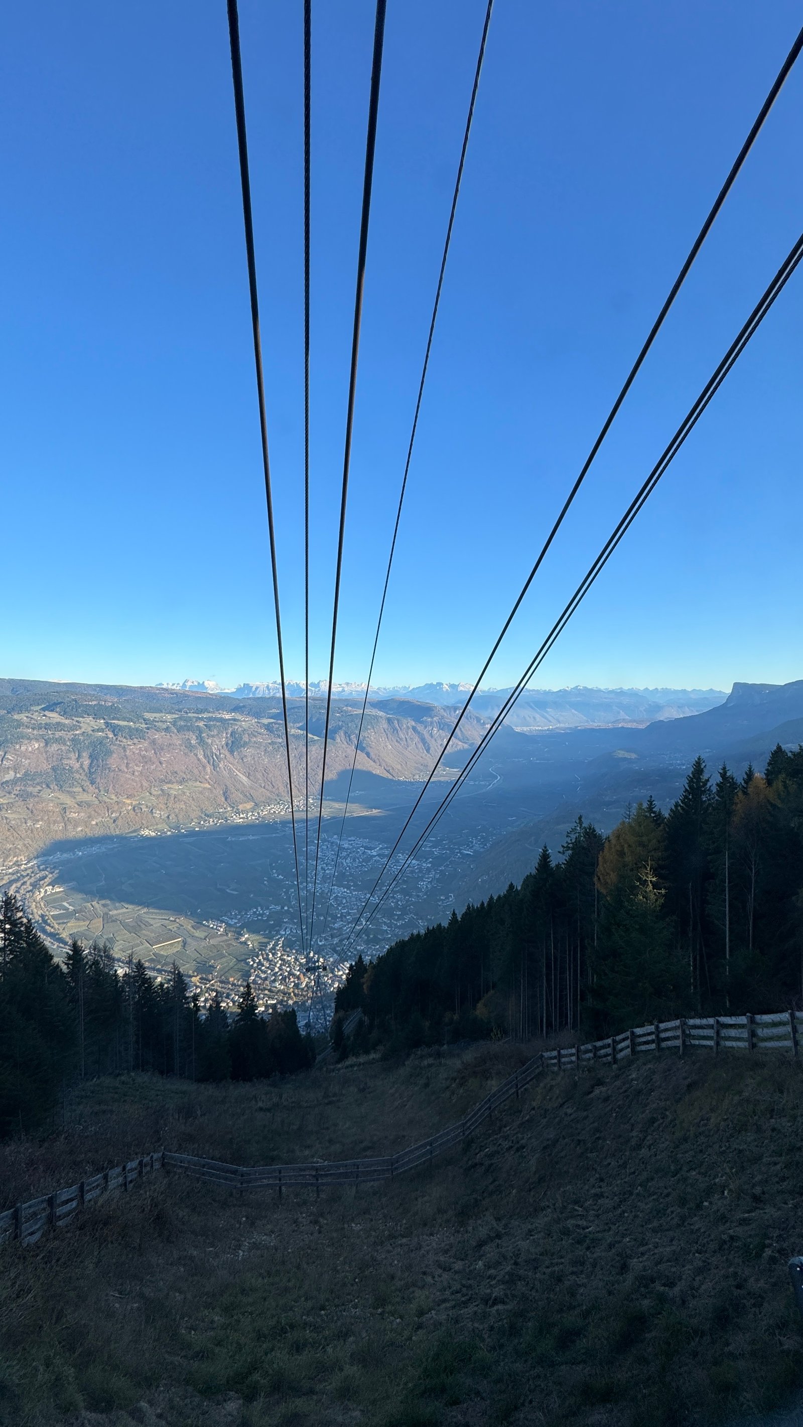 Vigiljoch cable lines converging above the valley, South Tyrol